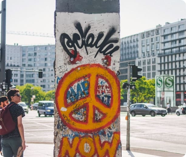 Berlin Wall segment covered in colorful graffiti